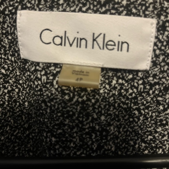Size 4 women’s Calvin Klein jacket. Fits like a small. Never worn out and about. - Picture 2 of 4